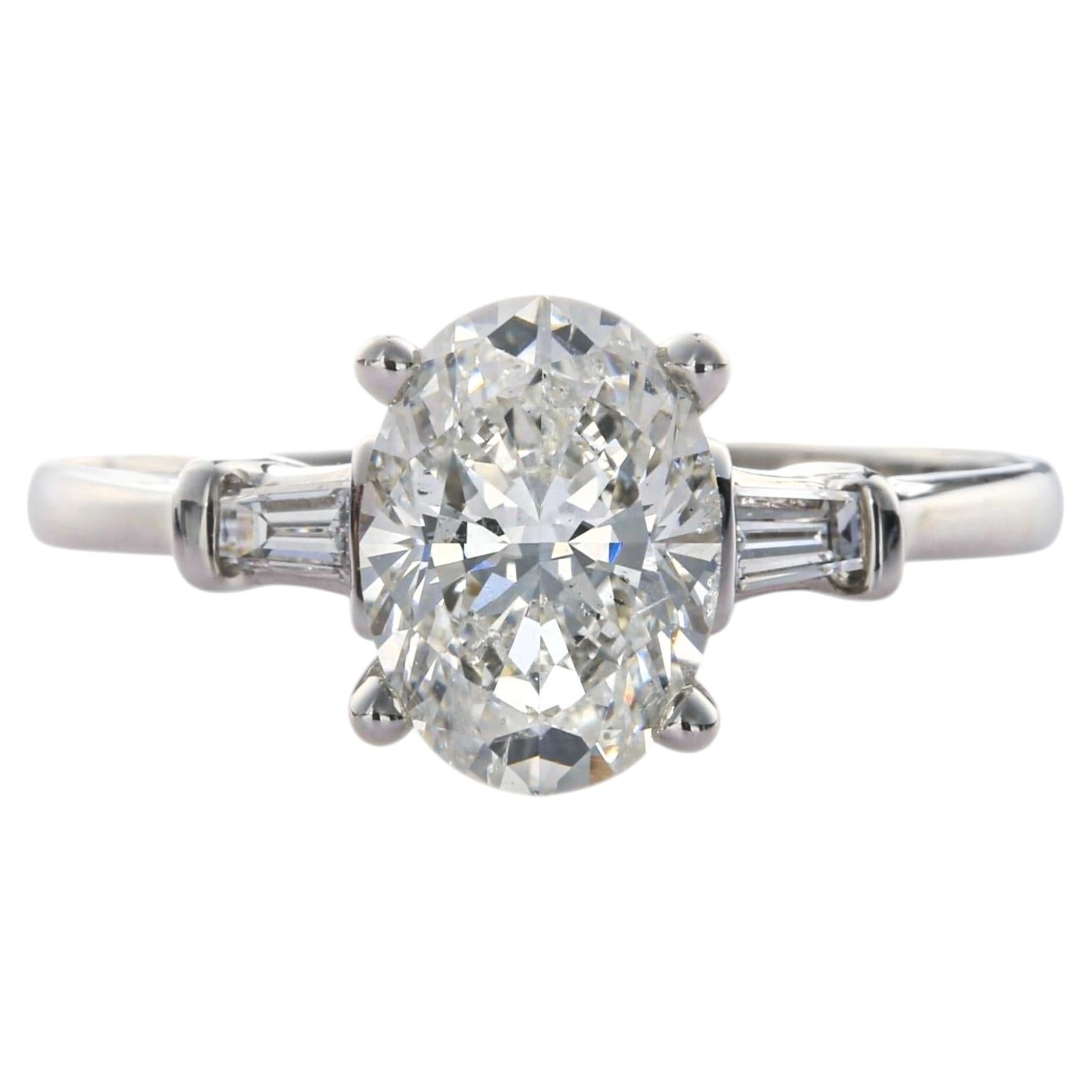 GIA Certified 2.01 ct Oval Cut Diamond Ring with Tapered Baguettes in Platinum
