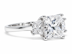 GIA 4.02ct H Color SI1 Princess Diamond Platinum Three-Stone Ring