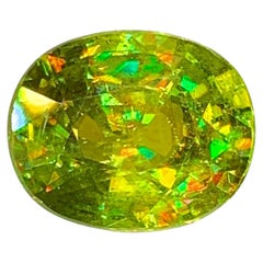 Esfena natural (titanita) de 3,10 quilates – Piedra preciosa suelta de corte ovalado con destellos arcoíris