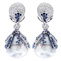 Boucles d'oreilles uniques en diamants, saphirs et perles