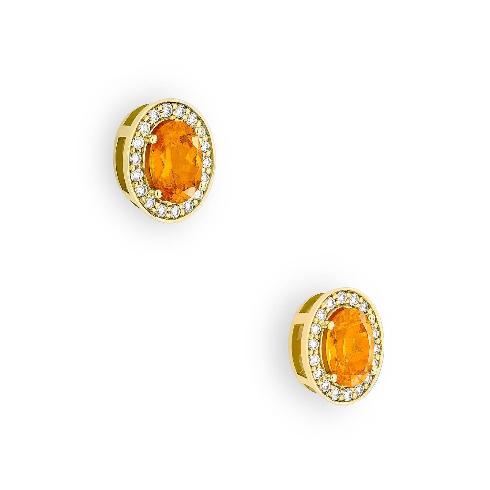 Fiery and bright, these delicate Empress Orange Studs are every way as vibrant and bold as the tropical bird that inspired them. Set with 4.6 tct orange garnets surrounded by 0.21 tct natural pavé-set diamonds, the Empress Orange Studs are