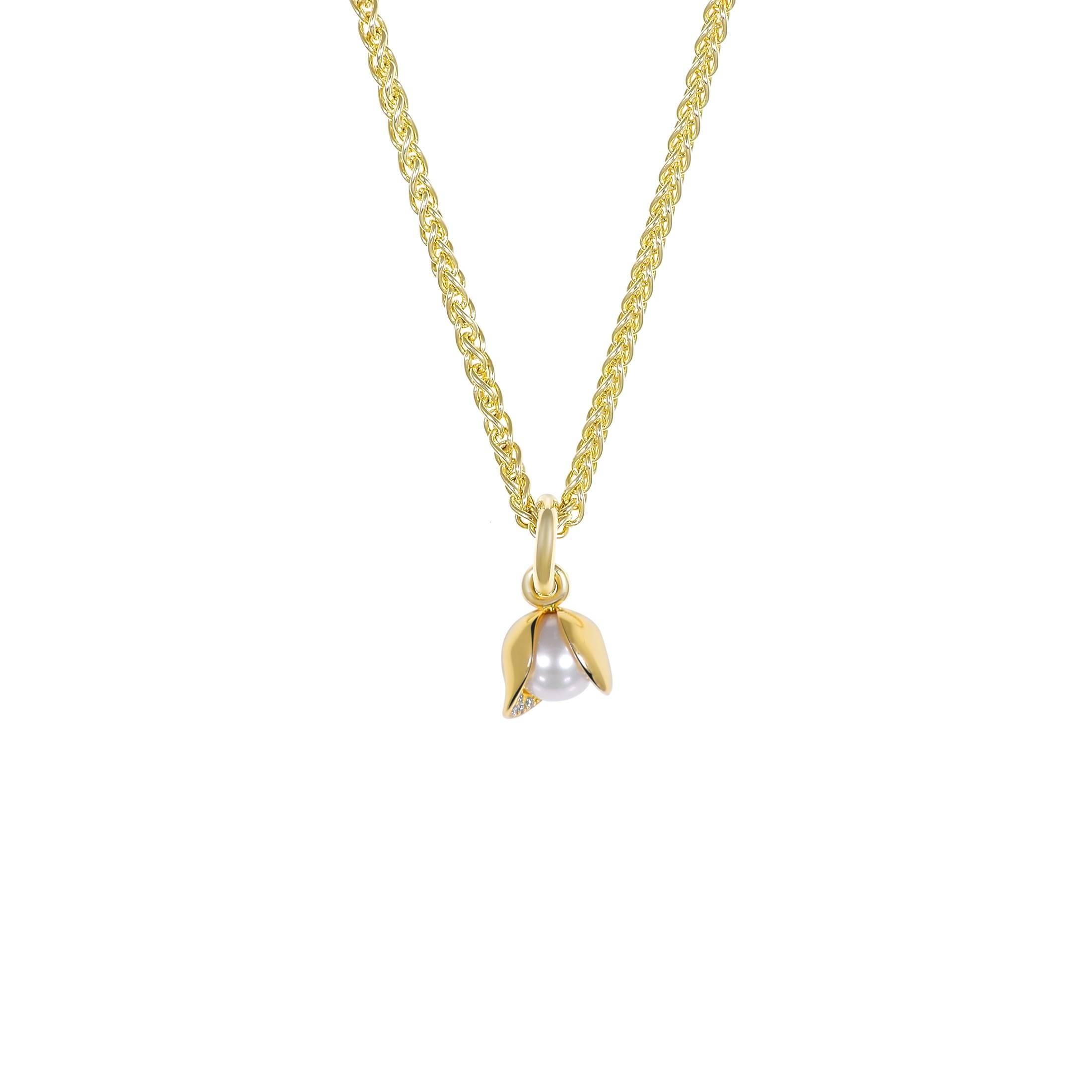 The Orchid Diamond Necklace is the perfect everyday luxe accessory. Subtle yet statement, its unique design brings a touch of sparkle to even the most casual of outfits. Handcrafted in 18k Fairtrade gold, this necklace features an 8 mm Akoya pearl