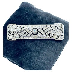 Spilla con diamante Art Deco, Japonisme Design in platino Circa 1920, 7,90 carati