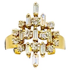 Vintage-Ring aus 18-karätigem Gold mit Diamantbesatz, Rund- und Baguette-Schliff, Großbritannien, 1960er Jahre