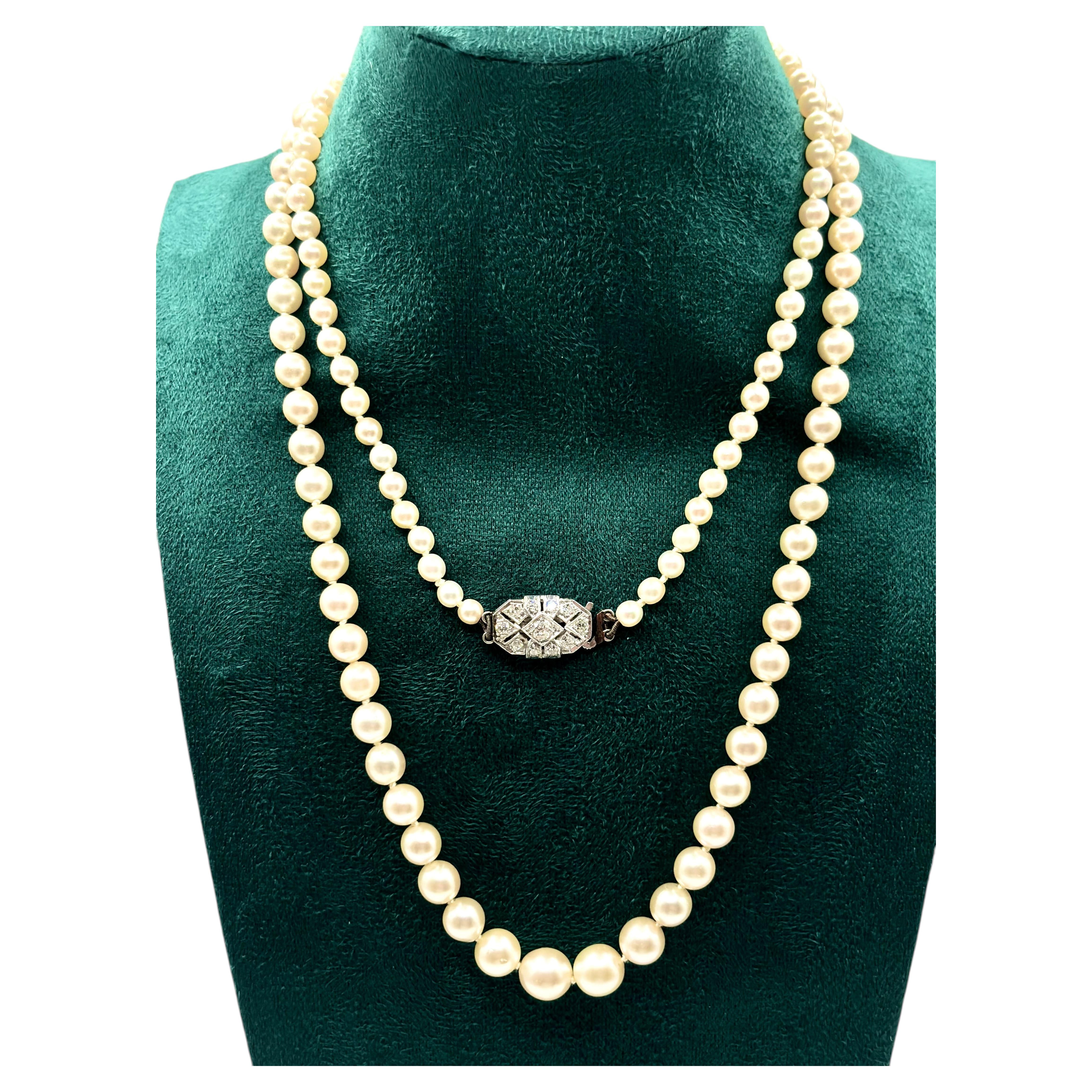 Collier Art déco en perles Akoya de tailles variées, diamants anciens, fermoir en platine, vers 1925