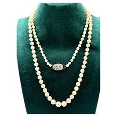 Art Deco Graduated Akoya Pearl Necklace Old Diamonds Platinum Clasp, circa 1925