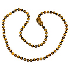 Long Tiger’s Eye Bead Necklace with Carved Chinese Prosperity Motif, 90 cm