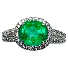 Oval Cushion-Cut Emerald and Diamond Halo Ring in 18K White Gold, 1.50 Carats