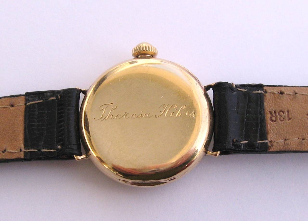 Tiffany & Co 18K gold wrist watch 
15 Jewels
Monogrammed on the back 
Watch measures .95