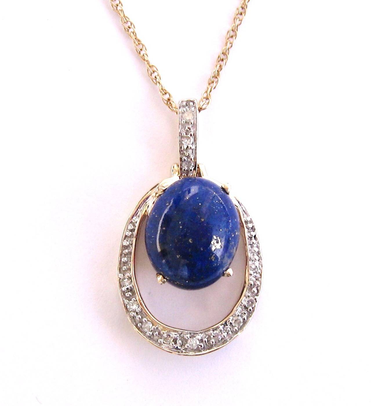 Stunning Lapis and Diamond Pendant 
Set in 10K Gold w/ 14K gold Petite chain 
Chain measures 18
