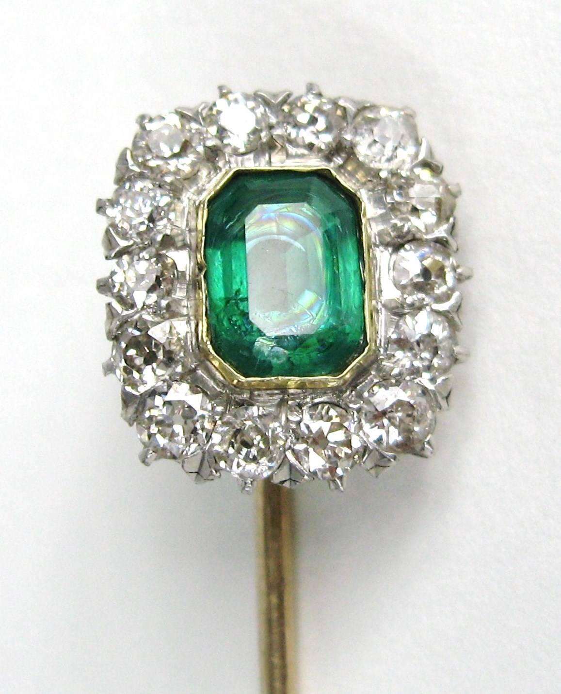 Antique Emerald and Diamond stick pin. Emerald and Diamond set in Platinum, stick pin is 14K. 
Emerald is .86 Carats with old European cut diamonds color H-J 
Clarity VS2-SI1
Top Measuring .50 x .55 
Stick is 2.80 inches 
Any questions please call,