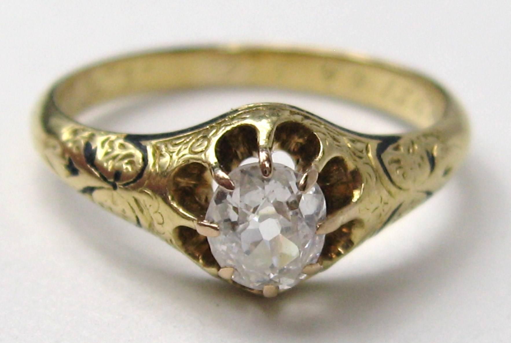 The inscriptions inside tell the story. Given to someone 12/29/1867.  What History!
Ring is an old mine oval cut diamond .45 Points set in 18k Yellow Gold 
Delicate detailing, claw prongs. Simply Stunning
Ring is a size 5.5 and can be sized by our
