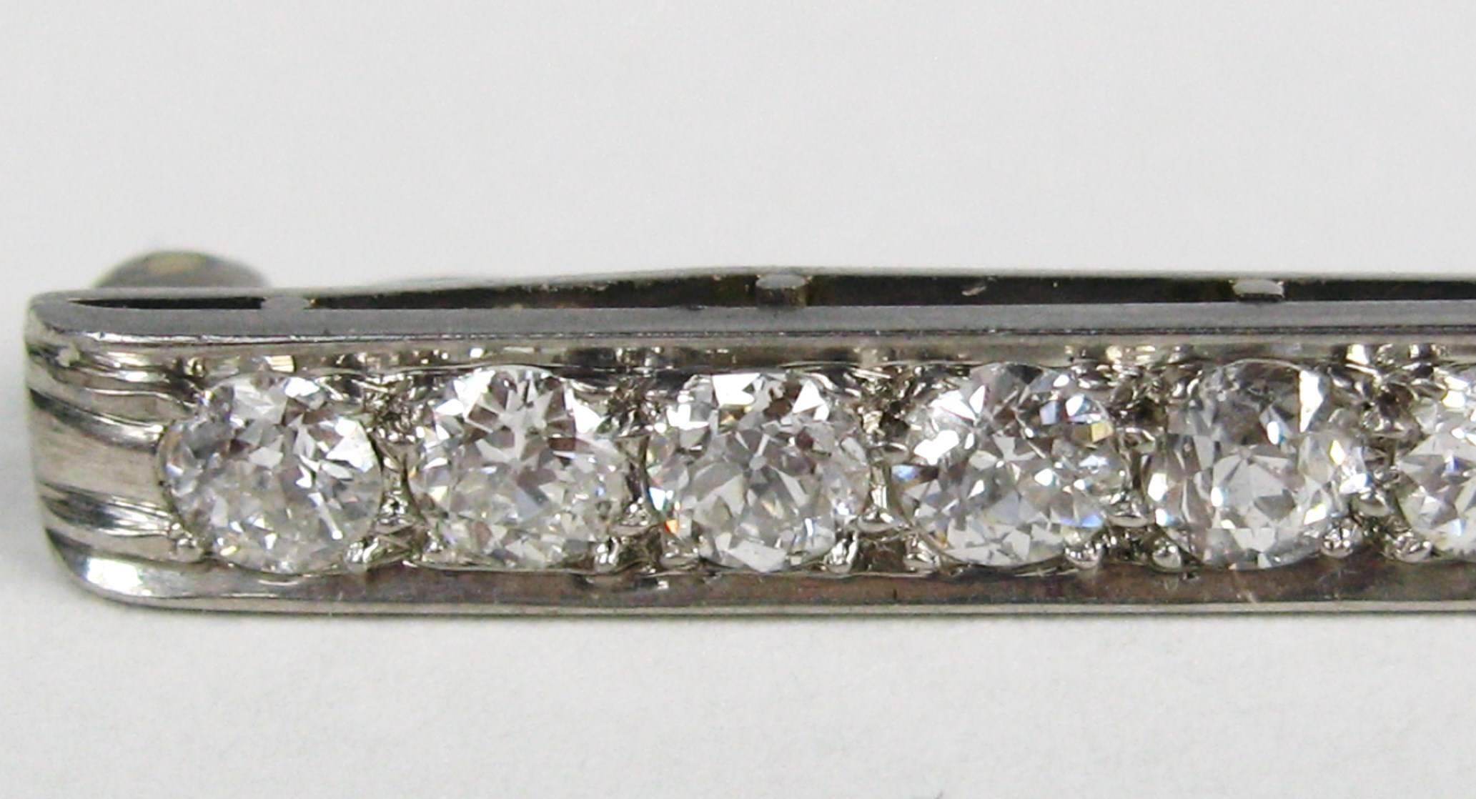Antique Diamond bar pin, designed as a single row of prong set round diamonds set in platinum with 2 carats of diamonds 16 diamonds in total. This is a stunning piece! 
Measuring 2.37 in wide x .17 in
Any questions please call, email of hit request