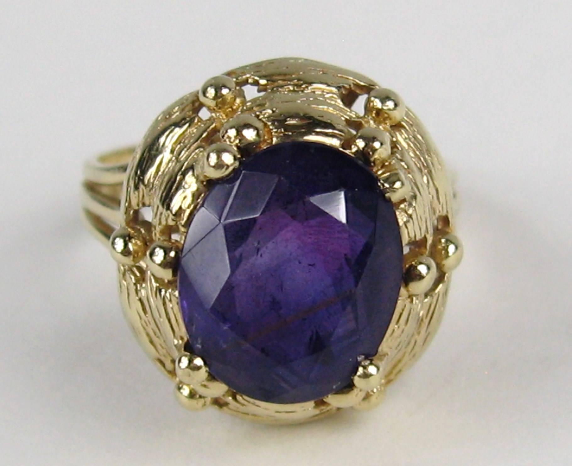 Oval Amethyst Approximately 3.60 Carats set in 14k Gold, Size is 7.5. Ring is set high .45 in. Ring can be sized by us or your jeweler.  Please check our storefront for hundreds of pieces of jewelry including hundreds of New Old Stock pieces of