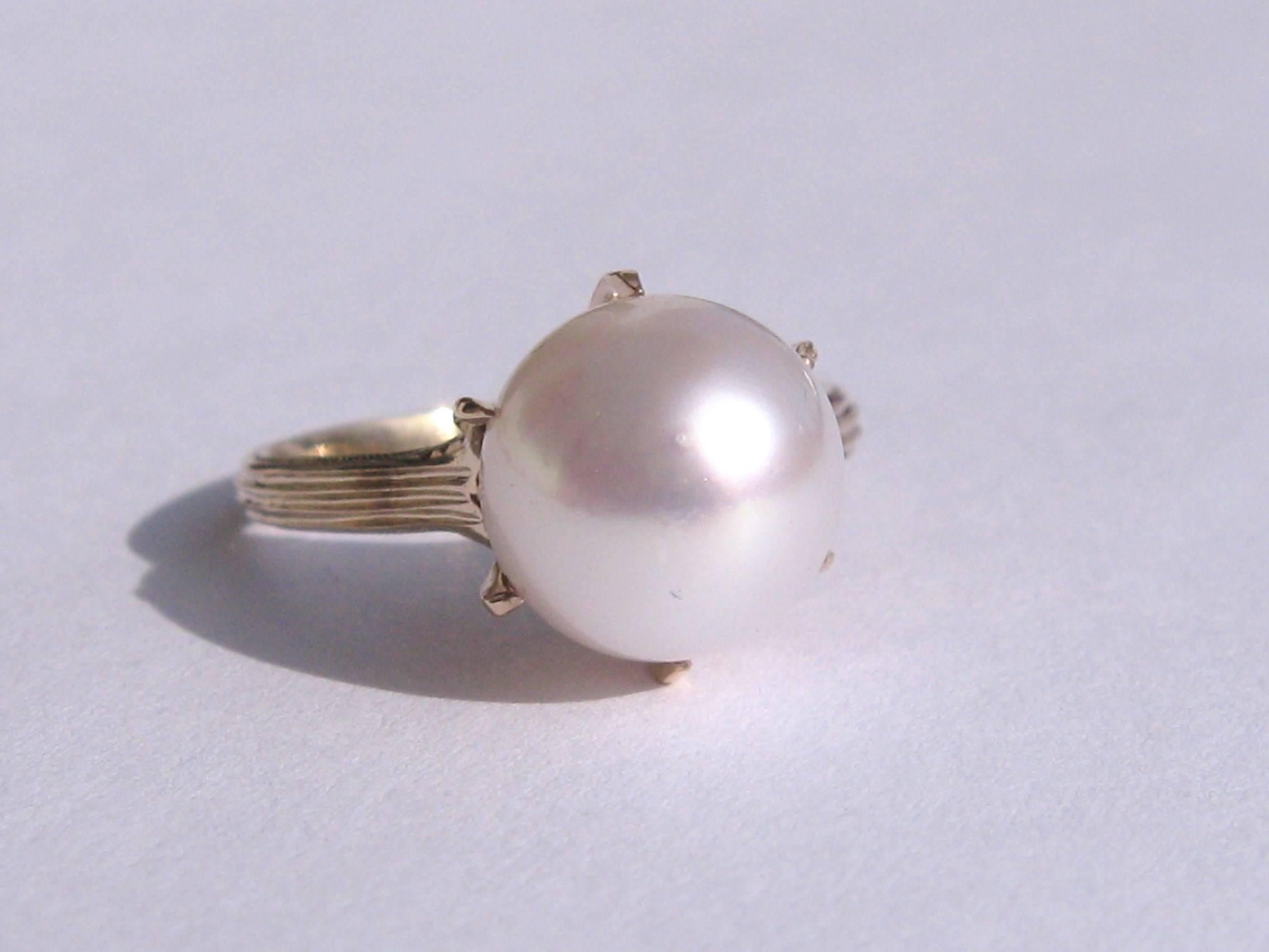 14K gold set 9.38 mm Pearl Ring Elaborate Claw setting, Size 6 and can be sized by you or our jeweler. Be sure to check our storefront for more fabulous pieces from this collection. We have been selling this collection on 1st dibs since 2013. You