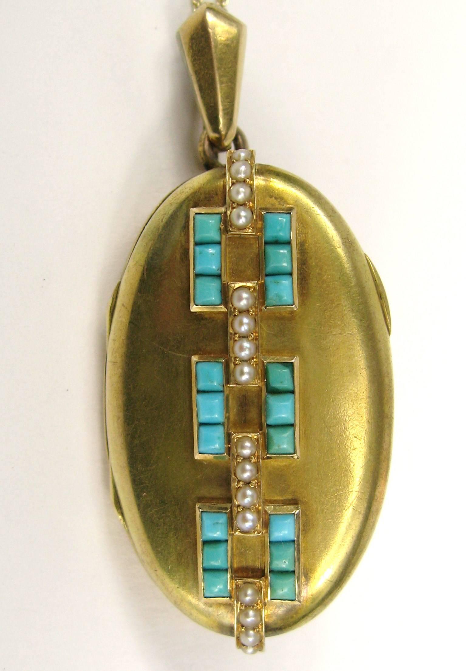 Victorian locket with a interlocking design of seed pearls and Turquoise set in 14K gold.  You can place a photo of a keep sake inside. I've added a gold chain with the locket. Large Bale can accommodate a larger chain if desired. Locket measures