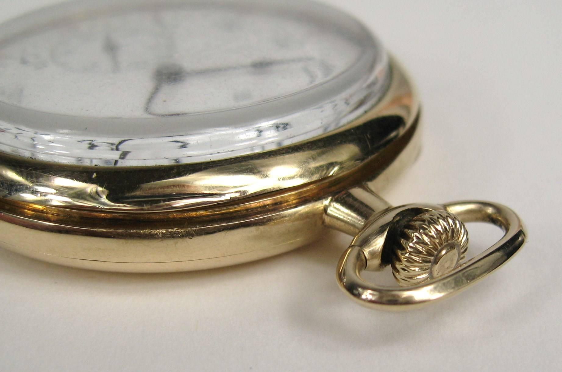 Antique 14K Gold Hamilton 19 Jewel Size 12 Open Face Pocket Watch.  Adjusted 5 positions Hamilton. Run date is 1919. Watch is working. 
Marked on movement Lancaster, Pa. 19 Jewels Adjusted 5 Positions Safety Pinion. Watch measures 59.58 mm top to