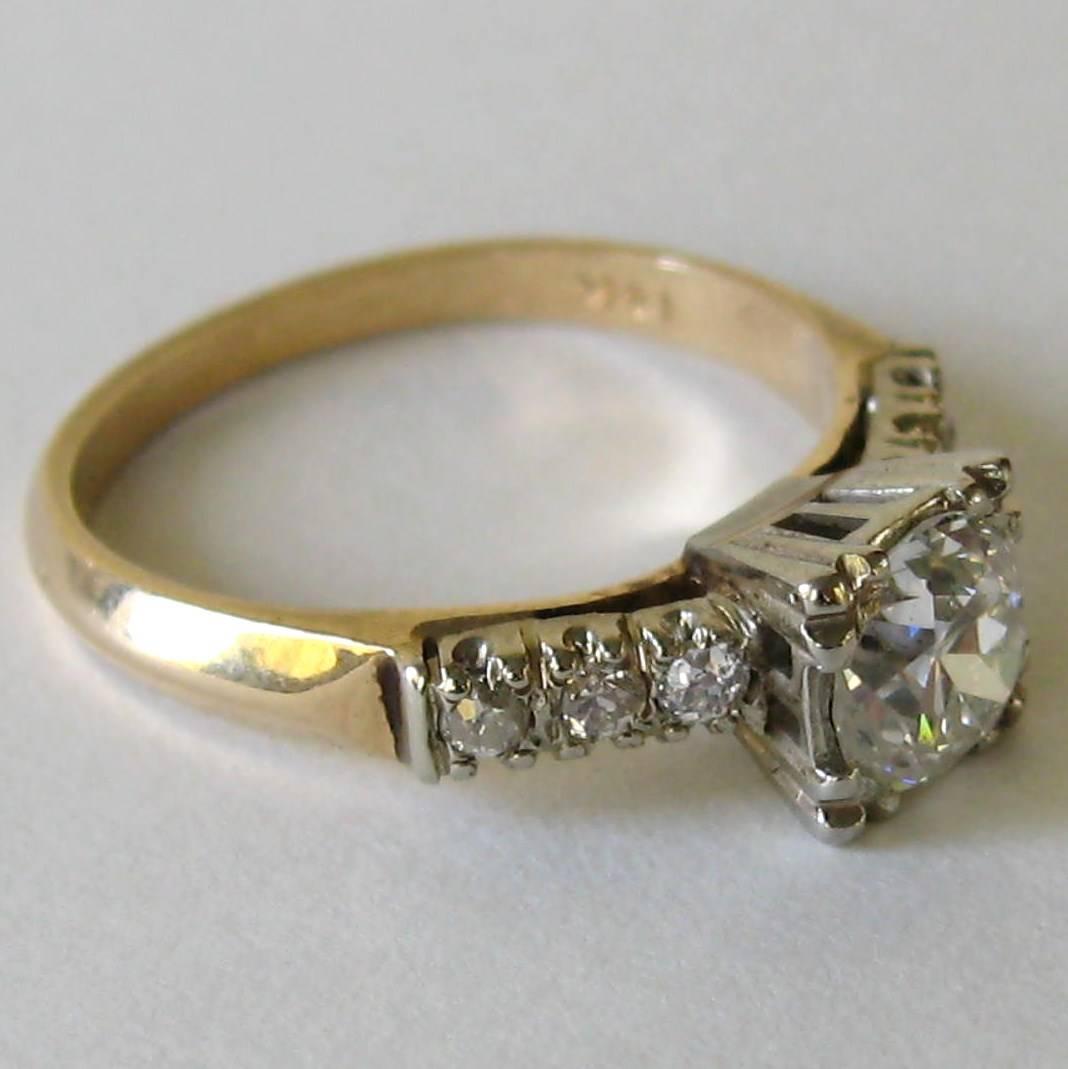 This is a wonderful Ring Circa 1930s that can be used as an engagement ring or just because. The specifics,  14K gold  Hallmarked as such, Mounting in White gold, Shank in Yellow. Old European Cut, Color-G, Clarity SI-1, Center diamond is 6.30 mm x