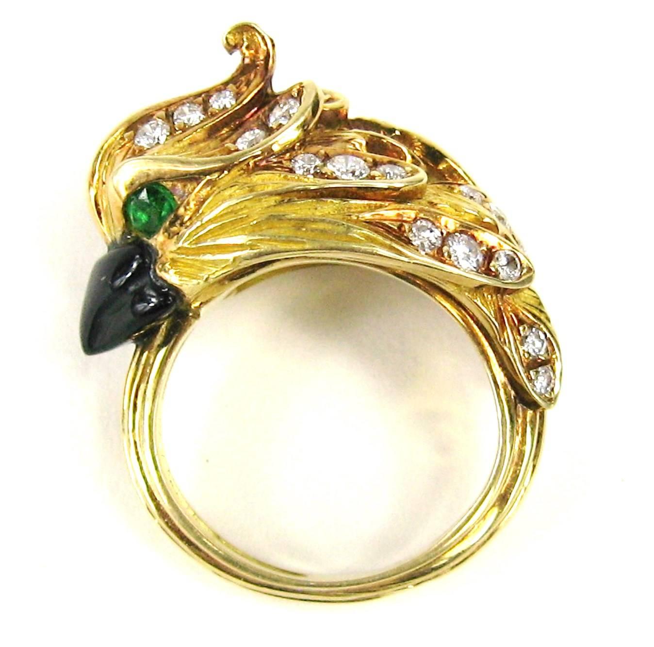 Stunning 18K Yellow gold Bird ring. The workmanship on this is exquisite. Hallmark is illegible, but I have more from this estate and this is possibly French  Bright clean diamonds scattered over the top of the birds head. Approximately a carat of