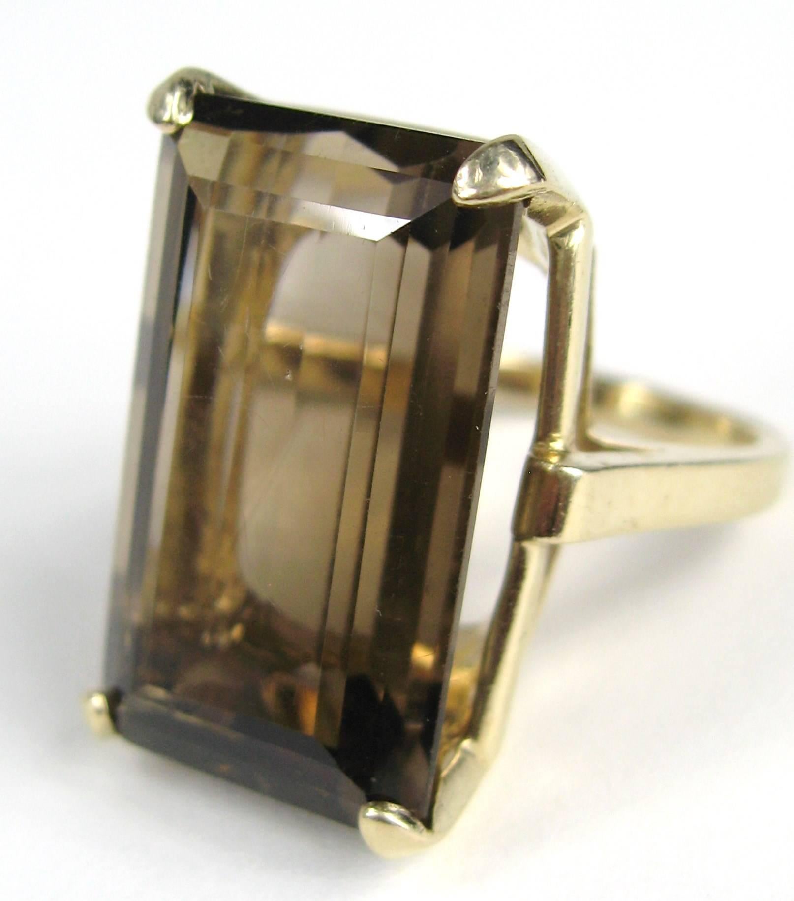 Massive Emerald cut Smokey Quartz ring set in 14K gold This is elegant and sophisticated. Ring is a size 8 and can be sized up or down by us or by your jeweler. This is out of a massive collection of Hopi, Zuni, Navajo, Southwestern, sterling