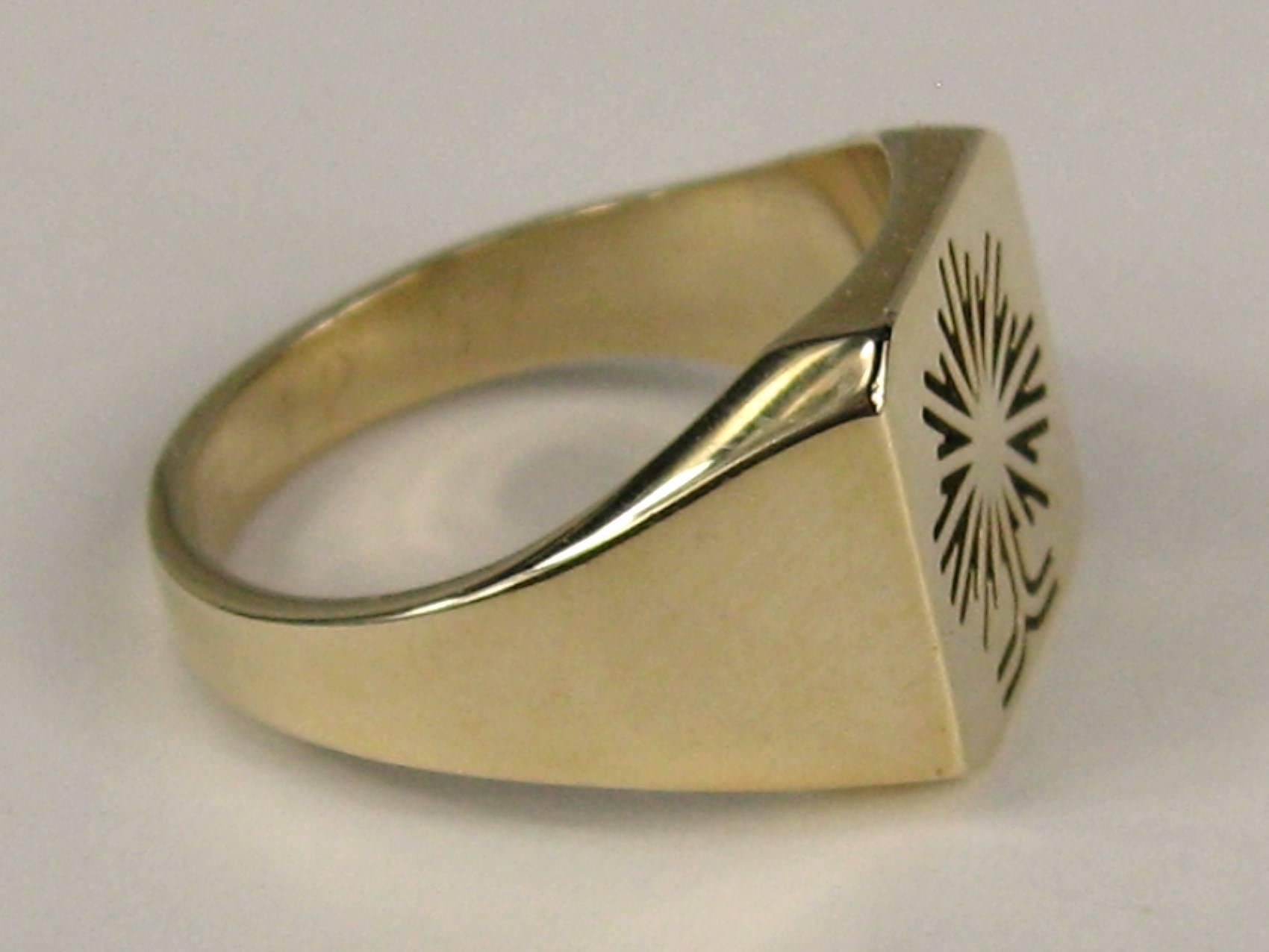 Modern in its design, a clean sleek gold ring with a tree motif. Inside its monogrammed 8/12/1957 WFJ.  10K Gold. This can easily be worn by a man or woman. Ring measures a 10 and can be sized by us or your jeweler.  Top of ring measures .53 in x