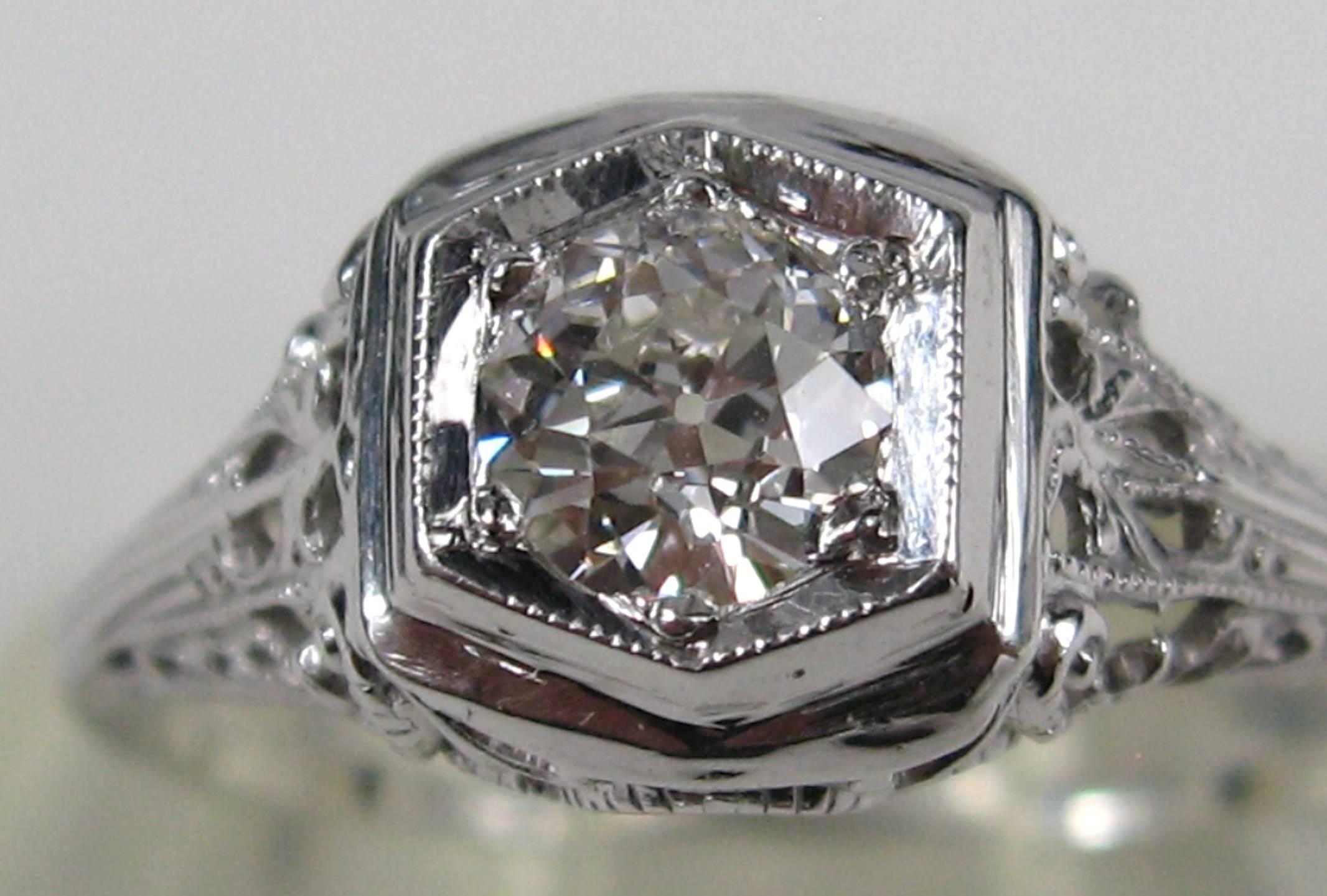1920's 14K White Gold Art Deco Engagement Diamond Ring. White Gold Diamond Ring Perfect for a promise or engagement ring wonderful open work motif. Diamond is VS Color G/H Stone Measuring 5.10 x 5.10 x 3.0 .50 Carats. The ring is approx a size 8.5
