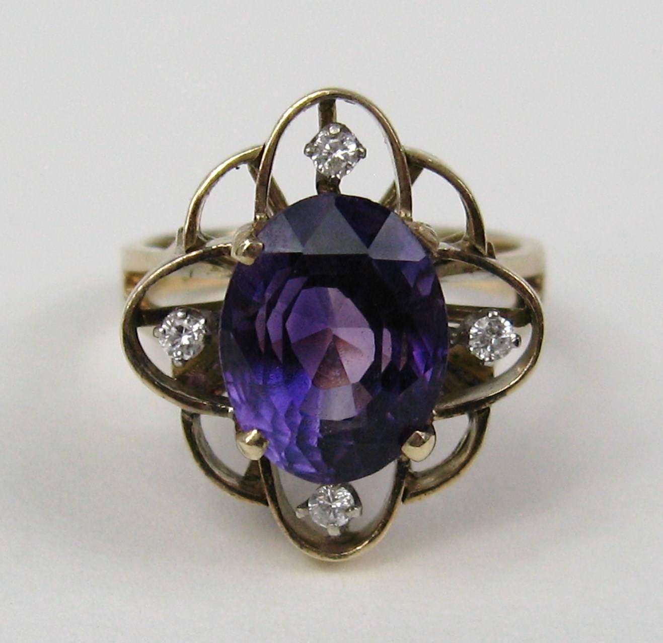 Amethyst and diamonds set in 14K yellow gold, the Amethyst is 4.4 Carats. Size 7+ Can be sized by your jeweler or us.  This is out of our massive collection of Hopi, Zuni, Navajo, Southwestern, sterling silver, costume jewelry and fine jewelry. Be