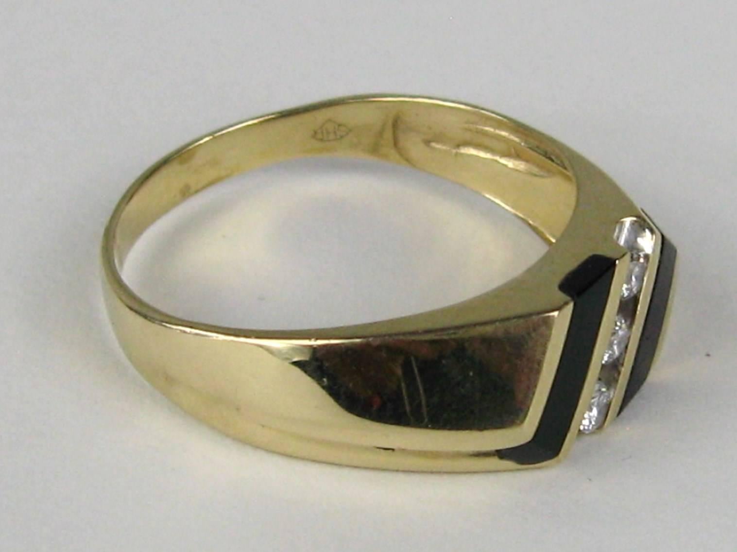 Distinguished Mid Century Men's Ring, channel set diamonds, Onyx inlay measurements are .30 inches wide. Ring is a size 12 and can be sized by us or your jeweler. This is out of our massive collection of Hopi, Zuni, Navajo, Southwestern, sterling