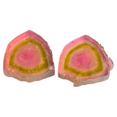 Coppia di fette di tormalina bicolore rosa e verde, naturale e rara, per orecchini