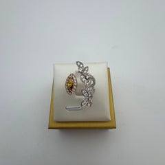 0.68 Carat Fancy Vivid Yellow Marquise and Fancy Pink Diamond Bypass Ring in 18K