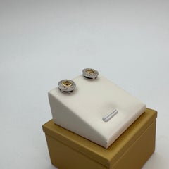 0.71 Carat Fancy Vivid Yellow Diamond Bezel Halo Stud Earrings in 18K White Gold