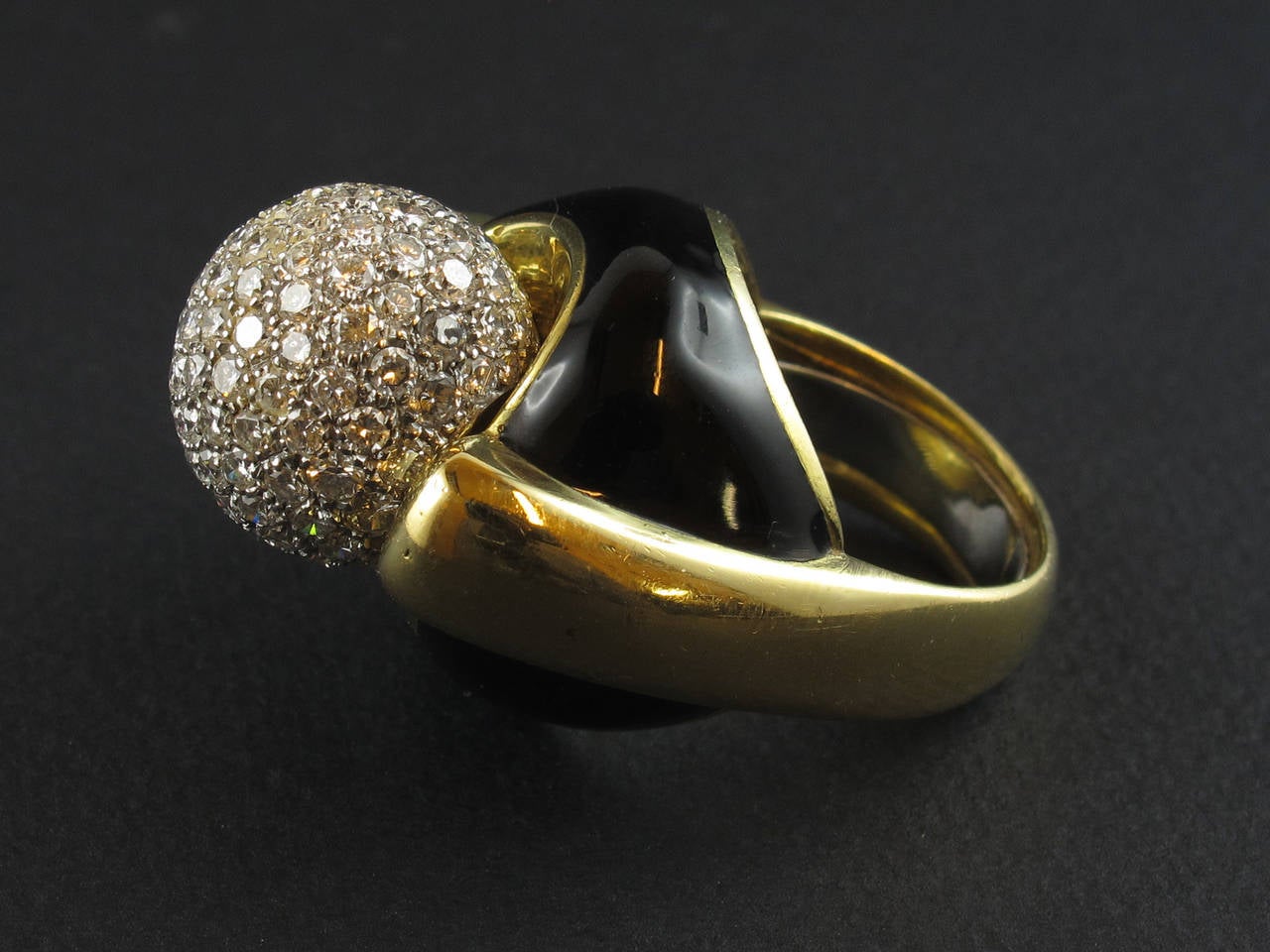 A yellow gold and diamond enameled ring by David Webb. 1970 c.a.