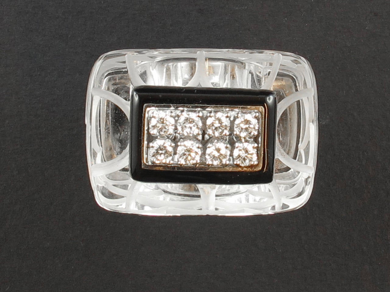 A white gold rock crystal and diamond enameled ring by Davis Webb, 1970 c.a.