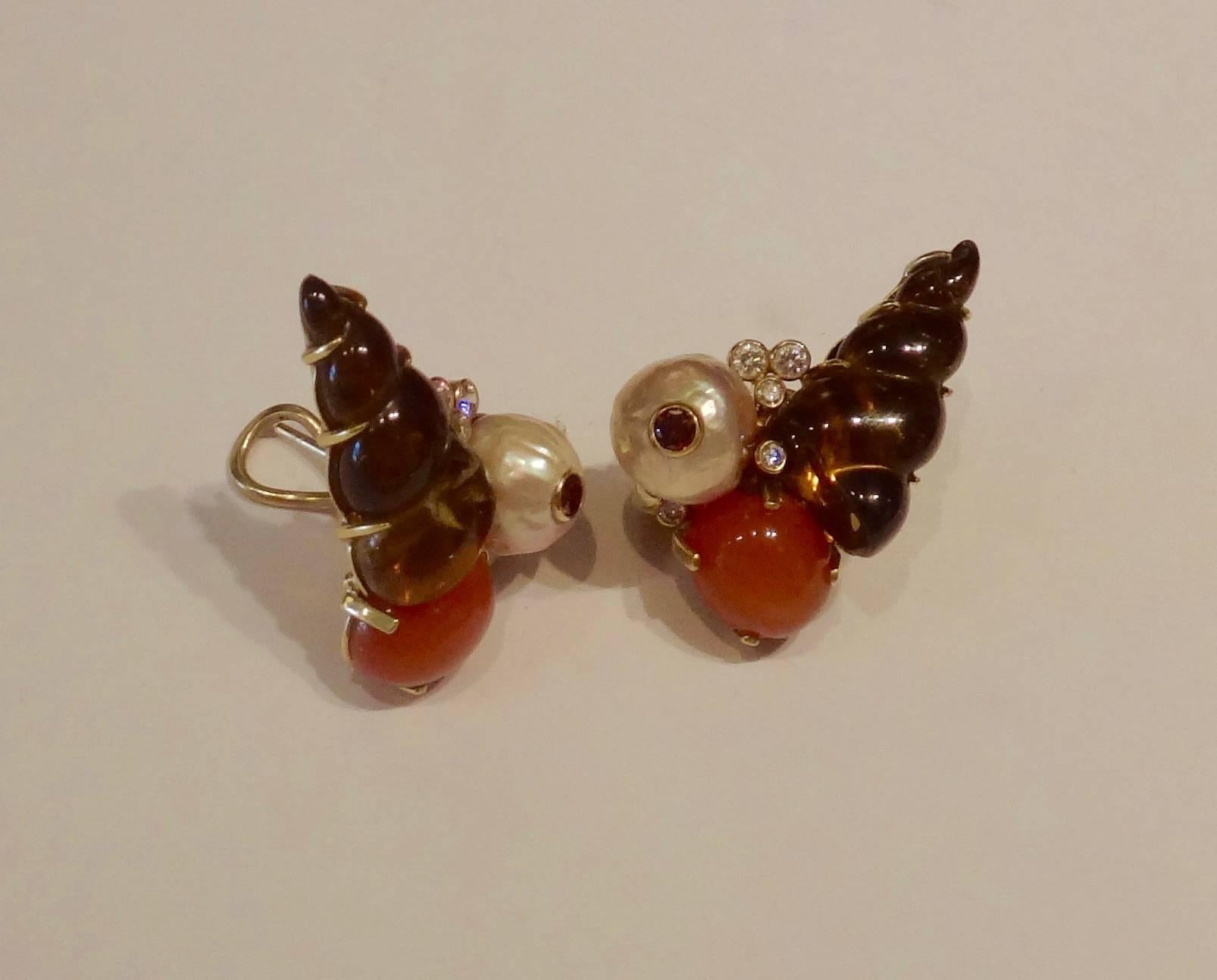 Carved citrines are combined with peach colored moonstones and Kasumi pearls along with cognac colored and white diamonds in these "Sealife" earrings.  Post with omega clip backs.  