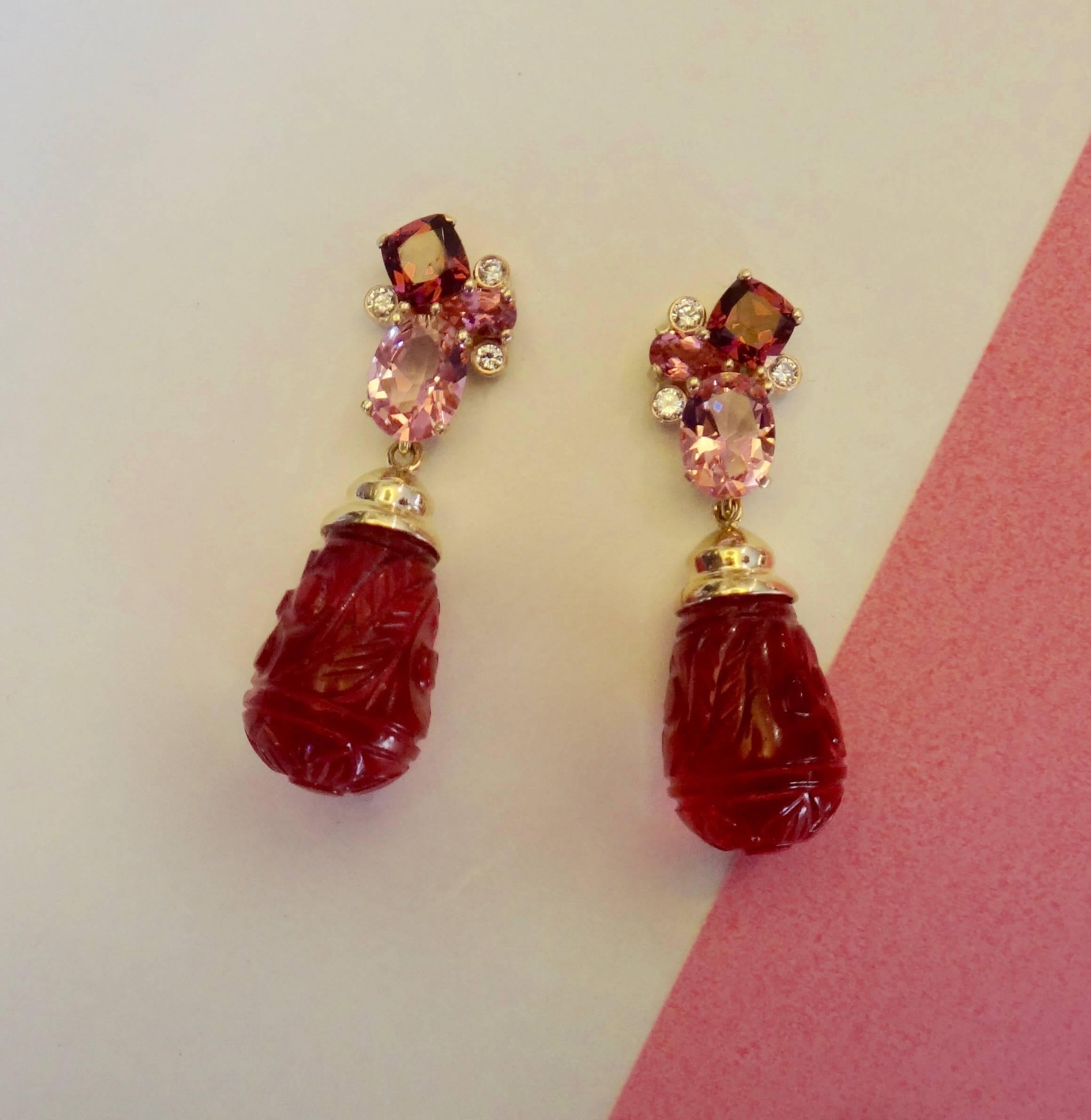 Indian carved pink topaz drops dangle from "Confetti" earrings composed of rhodolite garnets, pink tourmalines, pink topaz and diamonds. The handmade settings come with posts and jumbo friction backs.  