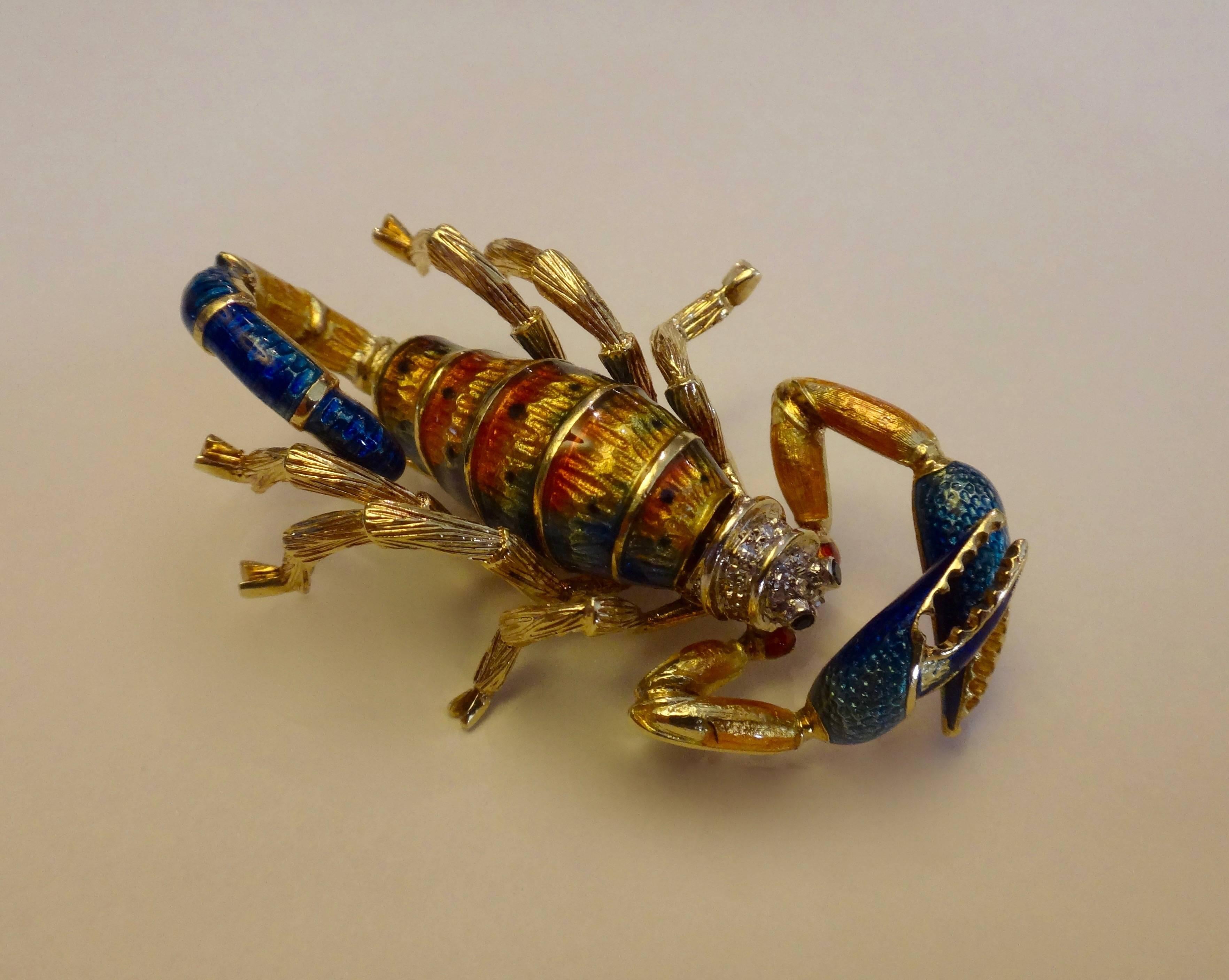 This whimsical scorpion brooch created in Italy of 18k yellow gold with multicolored enamel, pave diamonds and emerald eyes is full of character and charm. He would be wonderful on a jacket, coat or even a hat.  