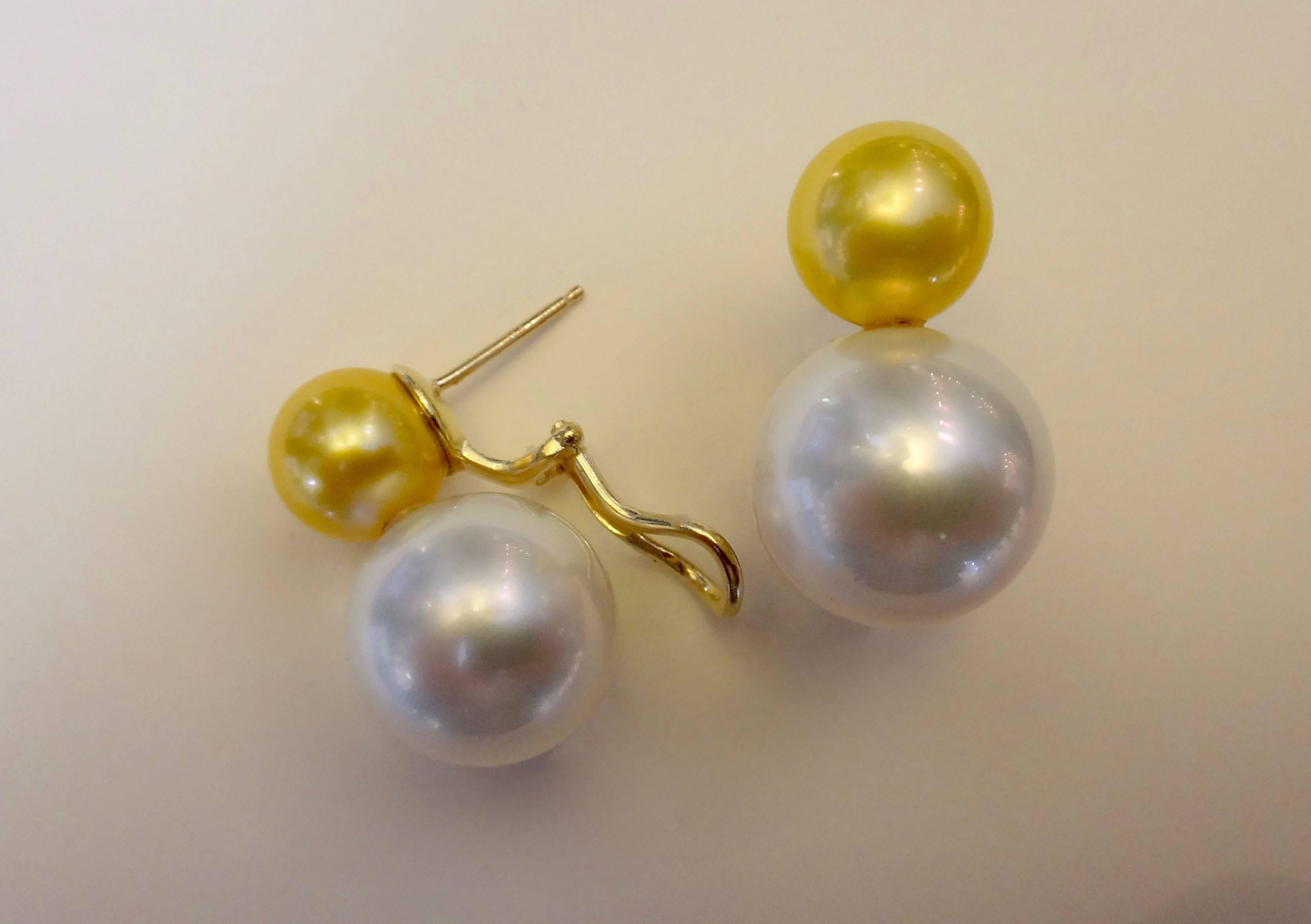 Gem quality golden South Seas pearls are paired with massive (15.5mm) gem quality white South Seas pearls in these "Due Perla" earrings.  Set in 18k yellow gold, the earrings have posts with omega clip backs for added security.  