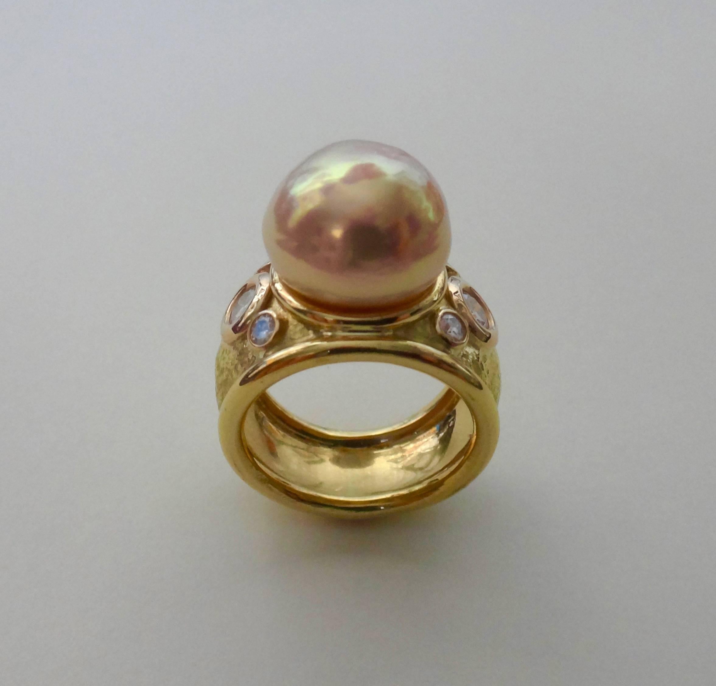 A 13mm Kasumi Pearl possessing great luster and finish , is featured in this hand fabricated "Bombe" style ring created in 18k yellow gold. Grown in the fresh water of Lake Kasumi ga Ura, Japan, these pearls are famous for their intense