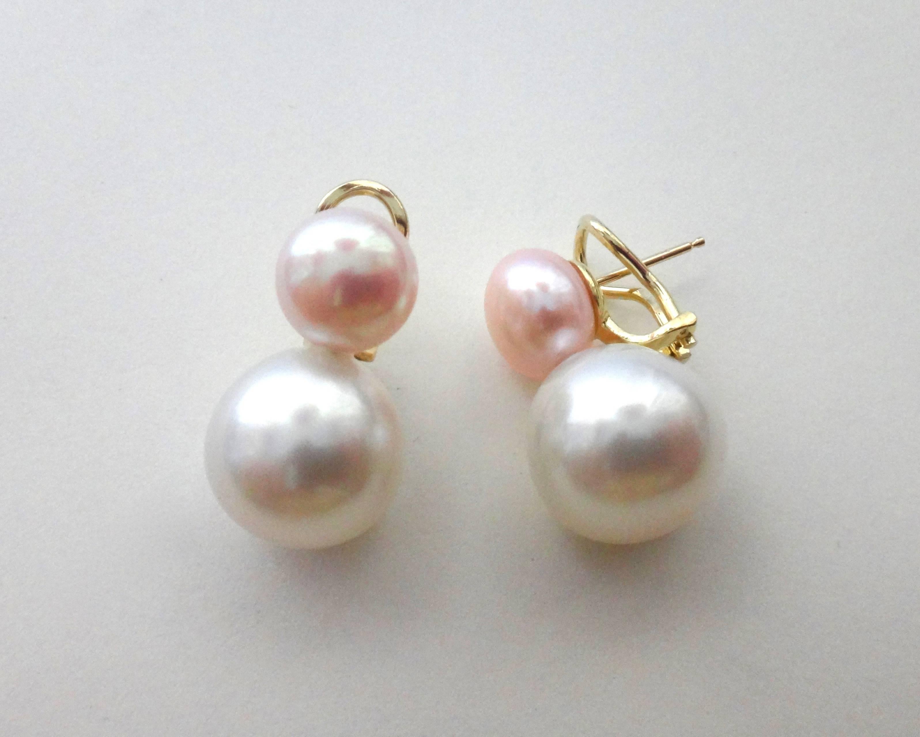 White South Seas and pink cultured pearls are paired in these "Due Perla" or two pearl earrings.  The pearls are statement quality, blemish free and possess great luster.  The earrings come with 18k yellow gold posts with omega clip backs