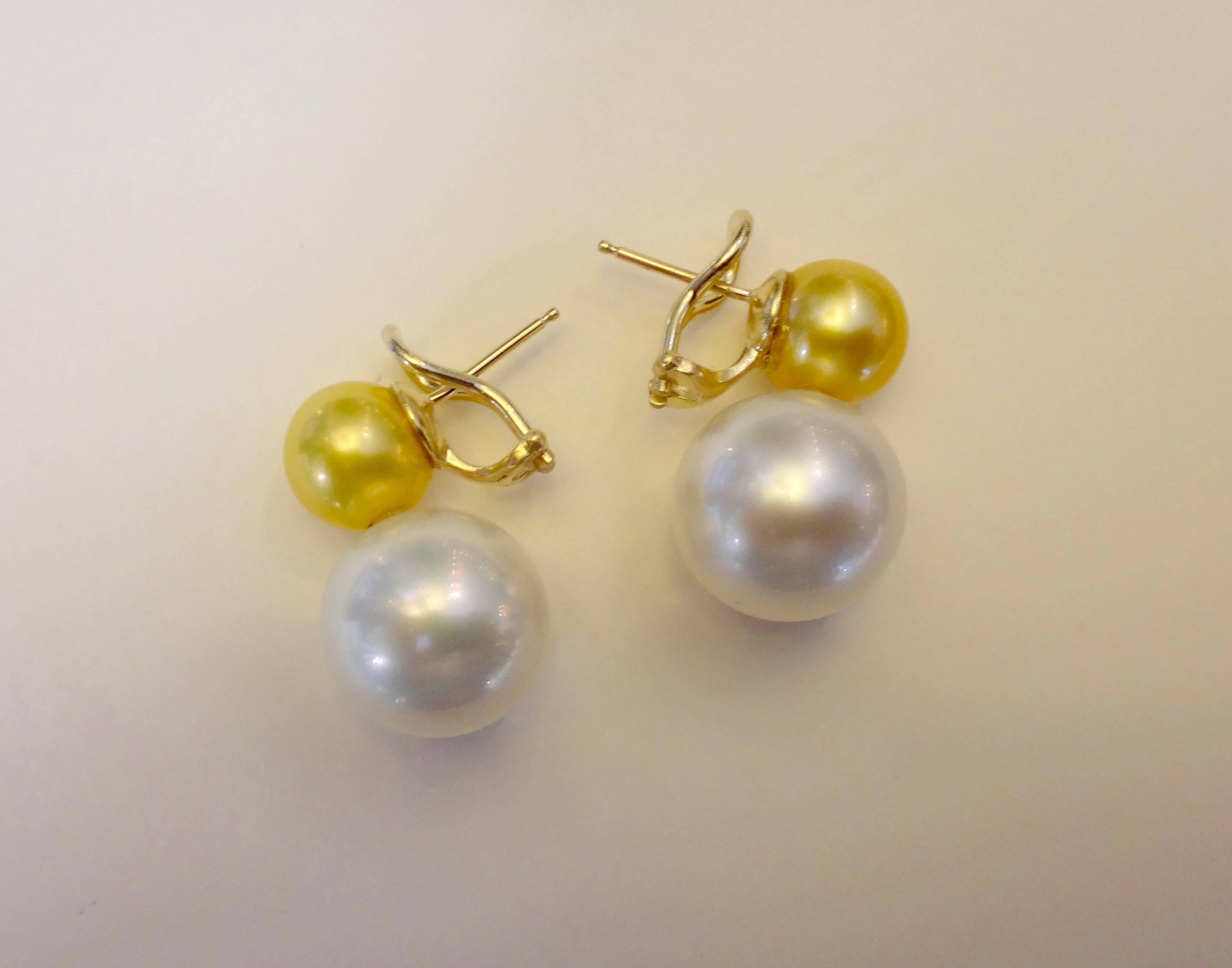 Gem quality golden South Seas pearls are paired with massive (15.5mm) gem quality Paspaley white South Seas pearls in these classic 