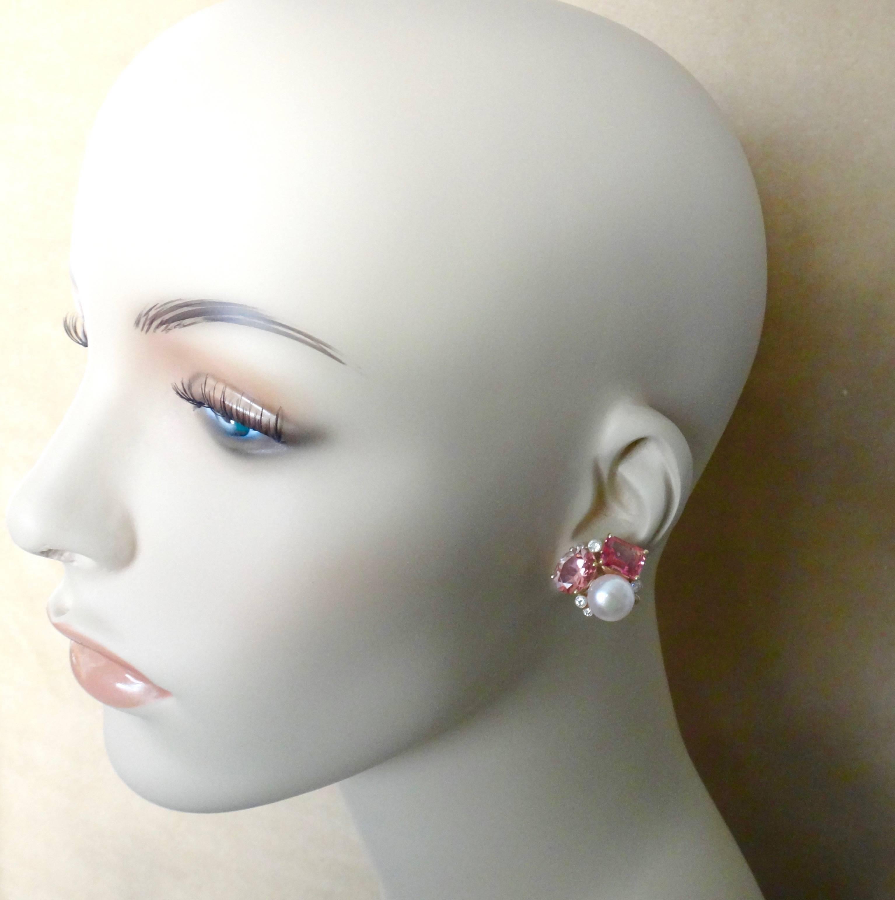 Emerald and oval cut pink topaz in two shades are paired with pink cultured pearls in these Confetti earrings.  The gems are further complimented with bezel set white diamonds.  The earrings have posts with omega clip backs for comfort and safety.  