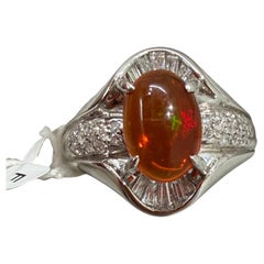 A Superb 1.25ct Mexican Fire Opal & Diamond Platinum Ring