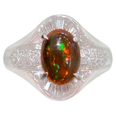 A Superb 1.25ct Mexican Fire Opal & Diamond Platinum Ring