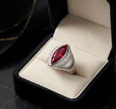 Vivid Marquise Cut Ruby (GIA) and Round Diamond Halo Statement Ring in Platinum