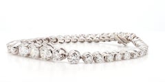 Pulsera tipo «tennis» con diamantes redondos de tamaño variable, de 5,60 quilates, certificada por el GIA, en oro blanco de 14K