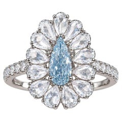 GIA 0.42 Carat Fancy Light Blue Pear Diamond Rose Cut Halo Platinum Ring