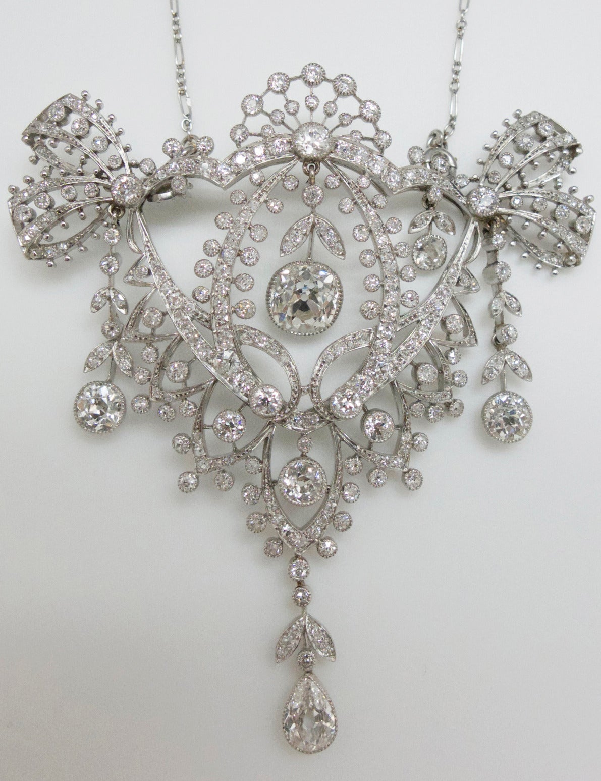 A platinum Henri Sandoz pendant with its chain; 