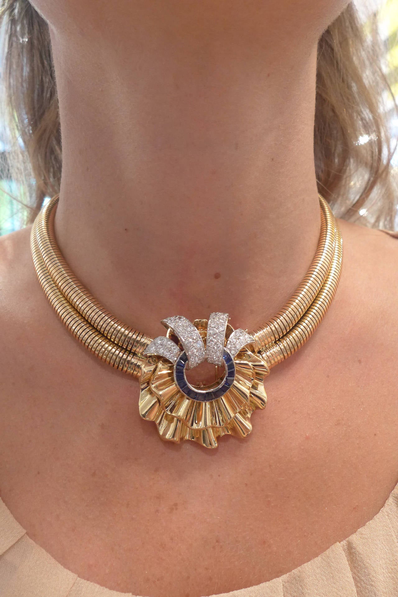 A spectacular yellowish-pink gold necklace made with two 
