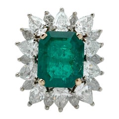 White and Yellow Gold Ring Set with an Emerald and Diamonds 2