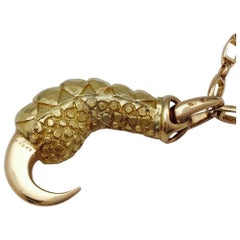 Yellow Gold Cartier "Eagle Claw" Pendant on a Cartier Gold Chaine
